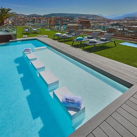 Hotel Barcelo Granada Congress Esterno foto Rooftop pool at the hotel