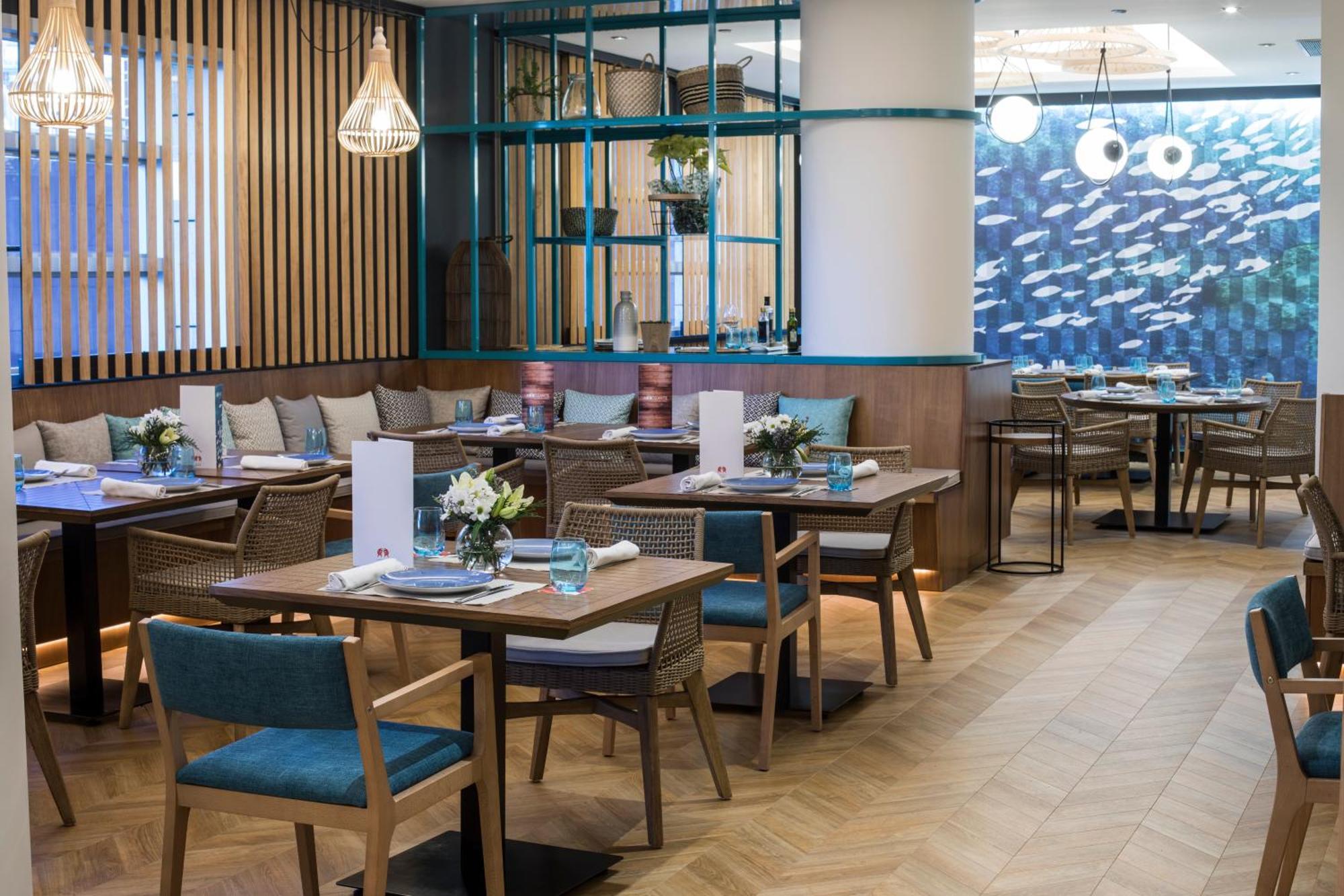 Hotel Barcelo Granada Congress Esterno foto The interior of the restaurant
